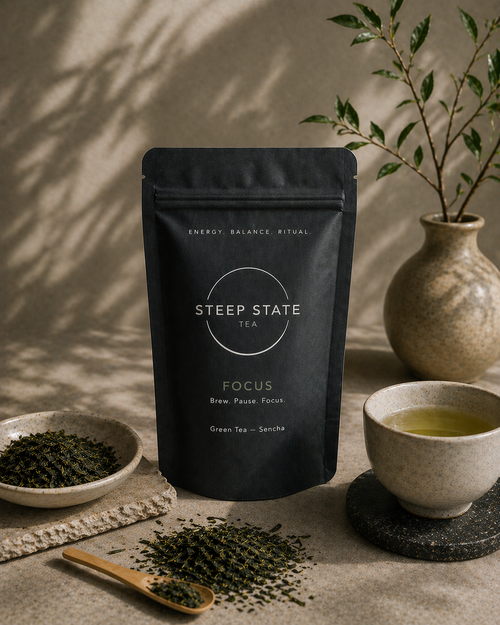 Organic Japanese Sencha tea from STEEP STATE TEA with brewed tea and loose leaves in a minimalist tea ritual setting